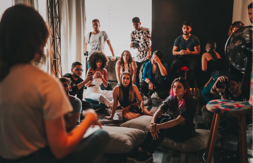 a speaker talking to people